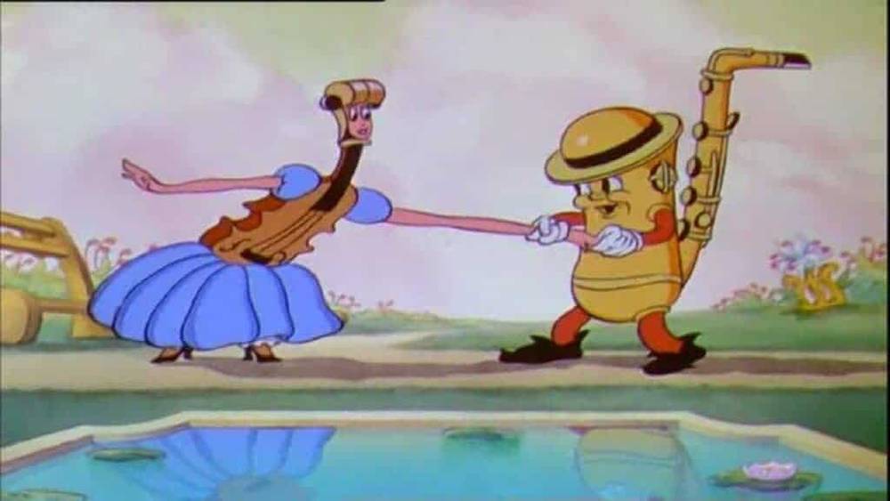 Image animée d'un personnage féminin ressemblant à une vadrouille avec une robe bleue dansant avec un personnage masculin ressemblant à un saxophone, à la fois anthropomorphe et coloré, au bord d'un petit étang dans un décor fantaisiste inspiré de