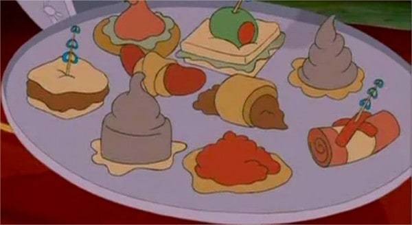 Illustration de dessin animé d'un plateau contenant divers aliments fantaisistes inspirés des films de Disney, notamment une tranche de gâteau, un dessert à la gelée verte et des pâtisseries de forme unique, le tout décoré de petits bleus.