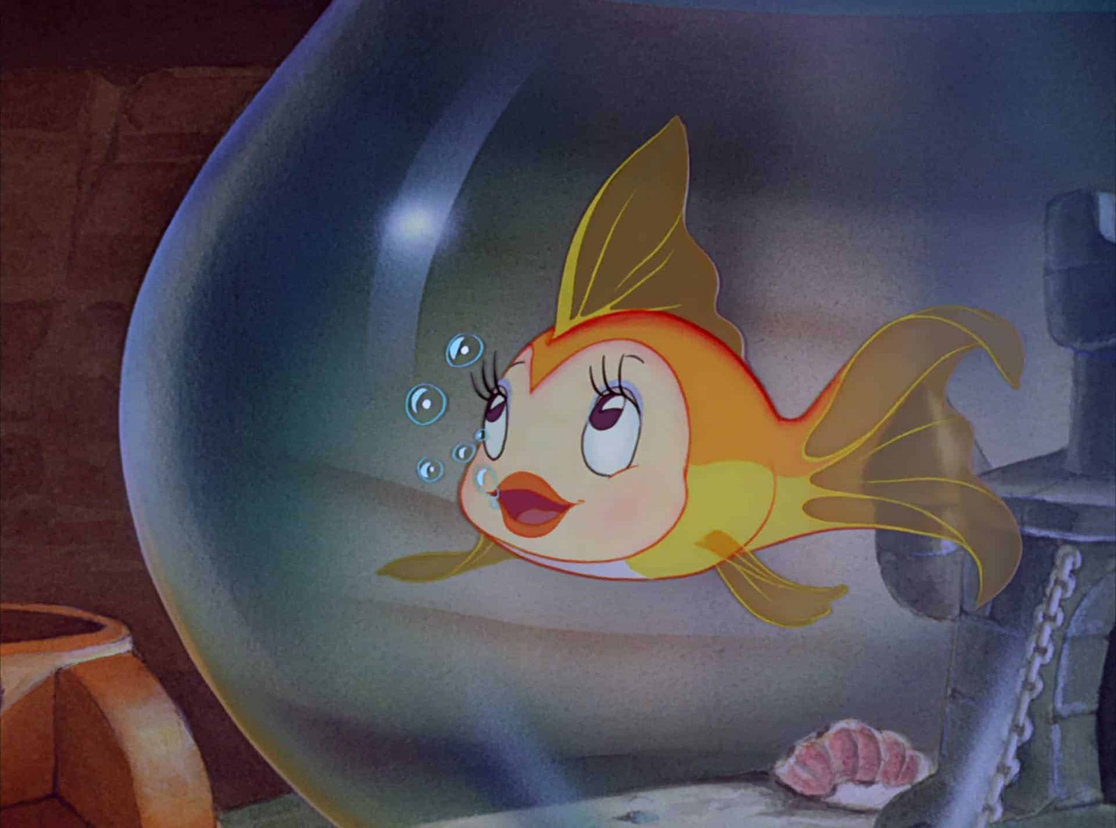 Une image de dessin animé d'un poisson Disney jaune et orange en détresse avec de grands yeux et de grandes lèvres, pleurant dans un bol en verre rempli d'eau. L’arrière-plan représente une scène intérieure sombre et sous-marine.