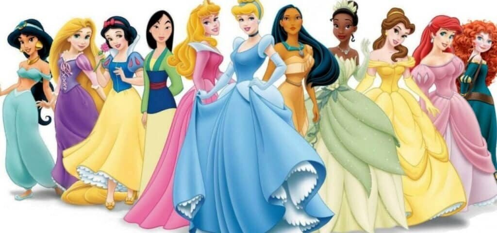 Une illustration colorée de diverses princesses Disney alignées ensemble, chacune portant ses robes emblématiques. Ils sourient et posent sur un fond blanc, prêts pour un quiz sur les princesses Disney.