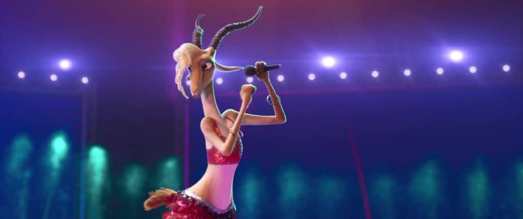 Personnage de girafe animé vêtu d'une robe à paillettes rouges inspirée de Zootopie, se produisant sur scène avec un microphone, un projecteur la mettant en valeur sous un fond éclairé en violet.