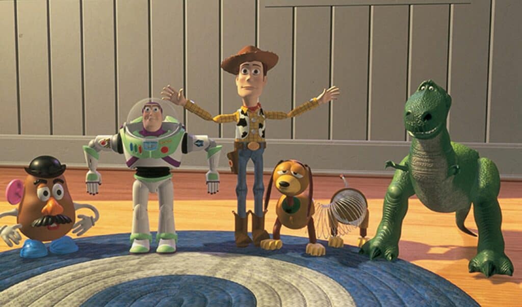 Personnages animés de « Toy Story » à l'intérieur : Woody, Buzz l'Éclair, Rex, M. Potato Head, Slinky Dog et un petit soldat. Le décor est une salle de jeux pour enfants avec