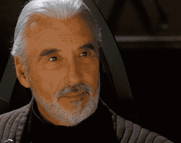 Gif d'un homme âgé ressemblant au comte Dooku de Star Wars, avec des cheveux blancs et une barbe, portant des vêtements sombres d'inspiration médiévale et une chaîne autour du cou, assis et hochant subtilement la tête