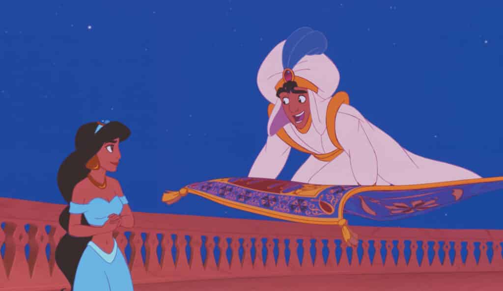 Aladdin, dans sa tenue de prince, invitant la princesse Jasmine à faire un tour sur son tapis volant magique, tous deux exprimant leur enthousiasme sous un ciel étoilé.