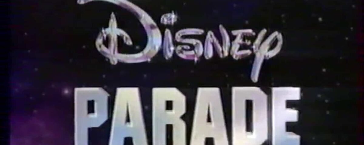 Le logo de « Disney Parade » présente un script « Disney » stylisé avec un fond d'étoiles scintillantes, évoquant un ciel nocturne, soulignant le thème magique du spectacle.