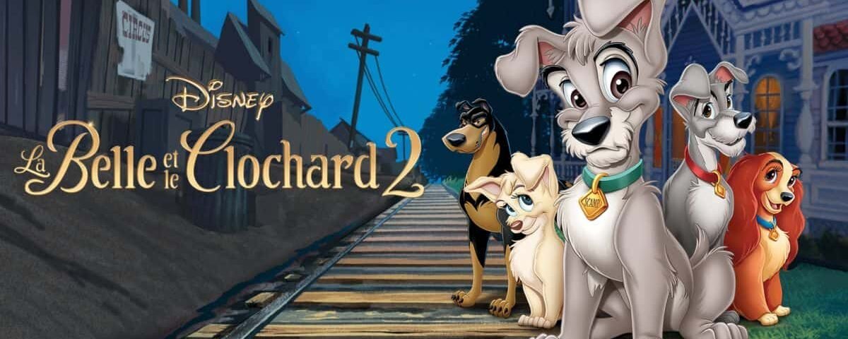 Image promotionnelle pour "La belle et le clochard 2", mettant en vedette cinq chiens animés de différentes tailles et couleurs se tenant ensemble sur une voie ferrée avec en toile de fond une ville nocturne.