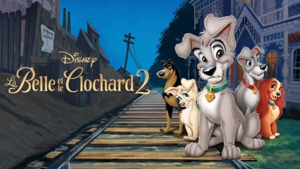 Image promotionnelle pour "La belle et le clochard 2", mettant en vedette cinq chiens animés de différentes tailles et couleurs se tenant ensemble sur une voie ferrée avec en toile de fond une ville nocturne.