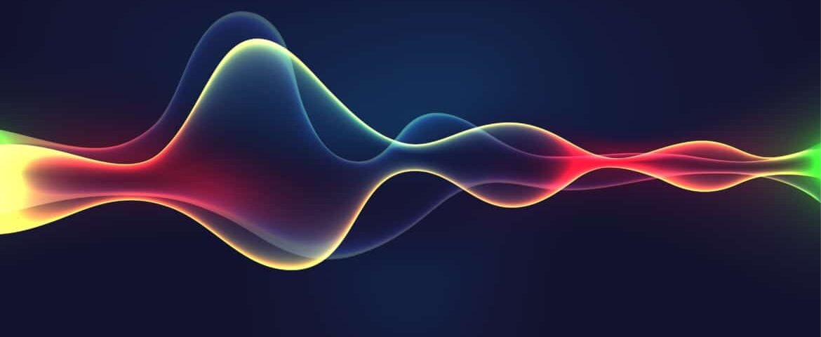 Forme d'onde numérique abstraite colorée avec des dégradés de bleu, rouge, vert et jaune se mélangeant doucement sur un fond sombre, représentant le flux et le mouvement car elle semble écouter le silence environnant.