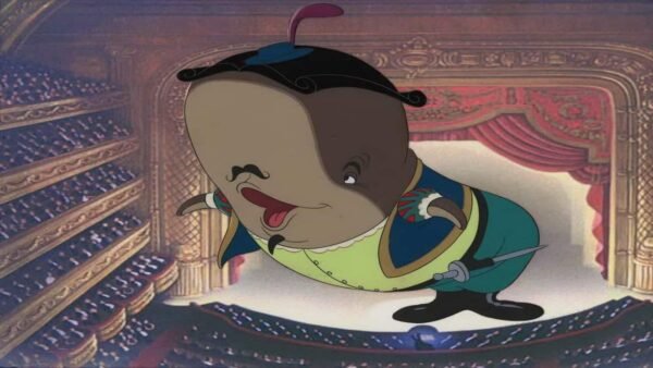 Illustration du personnage animé Humpty Dumpty, représenté en tenue noble traditionnelle, debout devant un grand auditorium de l'espace de mission richement décoré.