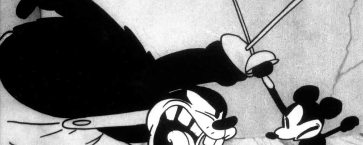 Scène de dessin animé en noir et blanc de "The Gallopin' Gaucho" montrant un personnage méchant brandissant une épée contre Mickey Mouse, qui se défend avec une arme plus petite.