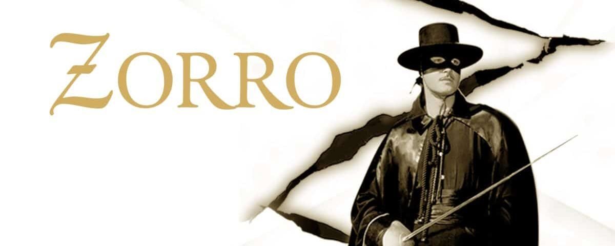Image promotionnelle pour Zorro représentant un personnage vêtu d'un costume traditionnel noir avec un masque et un chapeau, tenant une épée, sur un fond avec un effet de papier déchiré et le nom "Zorro