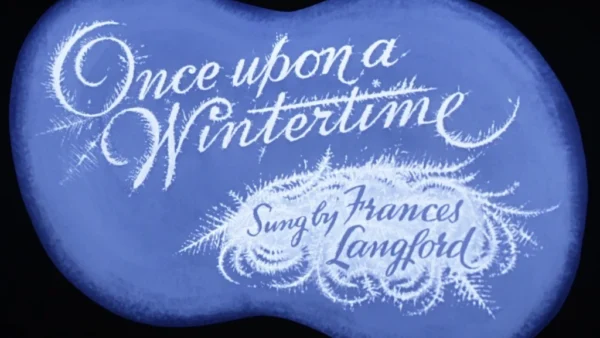 Un fond bleu en forme de nuage avec l'expression « Il était une fois l'hiver » écrite en élégante cursive blanche, inspirée de Disney. Ci-dessous, "chanté par Frances Langford" est inscrit