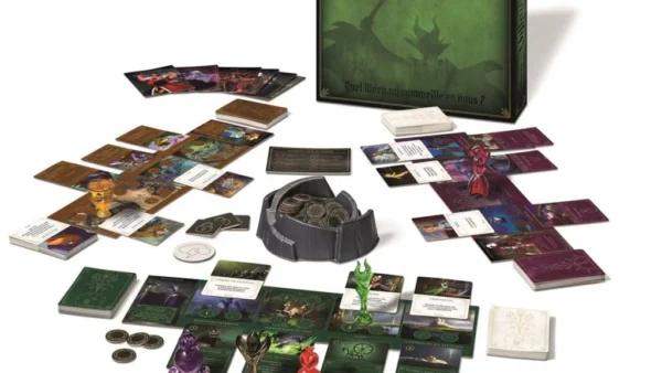 Une image du jeu de société Disney Villainous affichée avec sa boîte verte, ses figurines de méchants colorées, ses cartes, ses jetons et ses pièces de jeu étalées.