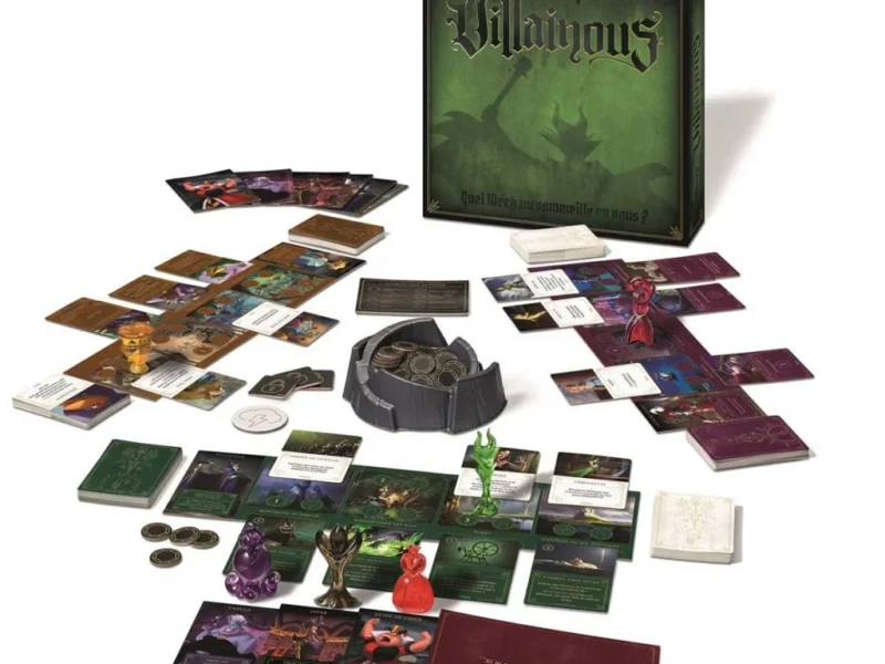 Une image du jeu de société Disney Villainous affichée avec sa boîte verte, ses figurines de méchants colorées, ses cartes, ses jetons et ses pièces de jeu étalées.