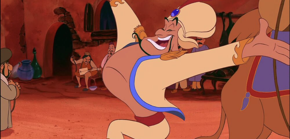 Une caricature d'un homme dansant avec un lion, qui rappelle les aventures magiques d'Aladdin dans le rôle du prince Ali.