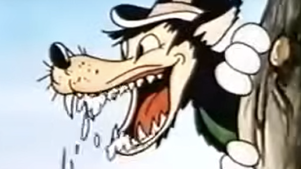 Un Grand Méchant Loup animé portant un chapeau se penche derrière un arbre, la bouche ouverte et bavant.