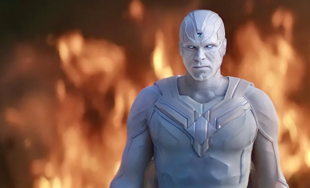 Une figure humanoïde à l'aspect métallique blanc et argenté se tient devant de grandes flammes brillantes, comme si elle se lançait dans une puissante quête de vision.