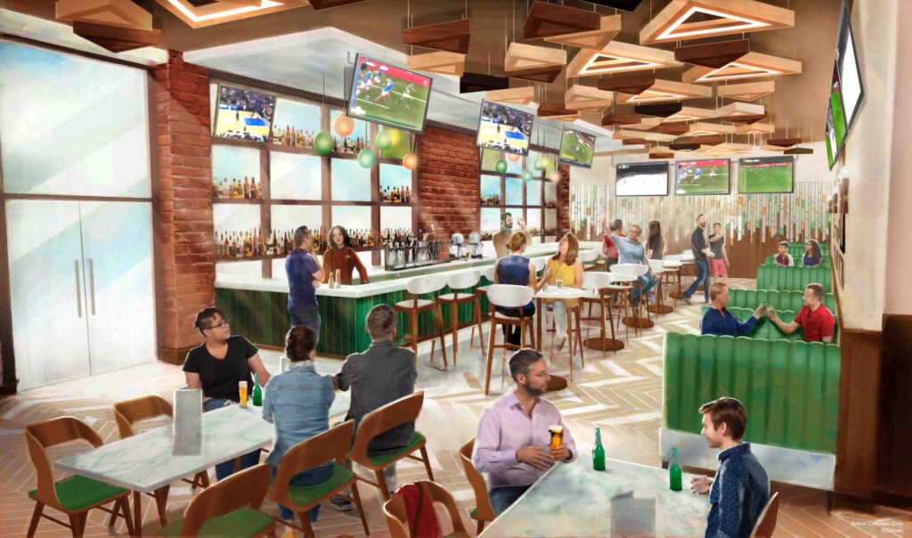 Un bar sportif moderne dans le Disney Village, à Disneyland Paris, avec des gens qui dégustent des boissons et de la nourriture à des tables et des cabines tout en regardant des matchs de basket-ball sur plusieurs téléviseurs - parfait pour la grande ouverture 22 novembre.