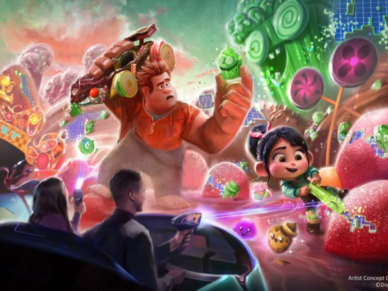 L'illustration conceptuelle d'un jeu d'arcade sur le thème de Wreck-It Ralph, inspiré par Buzz Lightyear's Astro Blasters à Tokyo Disneyland, met en scène Ralph et Vanellope dans un environnement sur le thème des bonbons, tirant sur des cibles à partir d'un véhicule de transport.