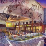 Place extérieure à Disney Village, où les gens se promènent et mangent sous de grands écrans sportifs numériques, des peintures murales d'animaux de dessins animés et une enseigne Coca-Cola sur un bâtiment moderne - vivez la magie alors que Disneyland Paris se dirige vers ses rénovations 2026.