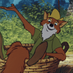 Le renard animé en chemise et chapeau verts, inspiré par Robin des Bois, est assis dans un panier tressé, un bras levé, entouré d'un feuillage luxuriant - une scène qui rappelle la première du film le 8 novembre 1973.