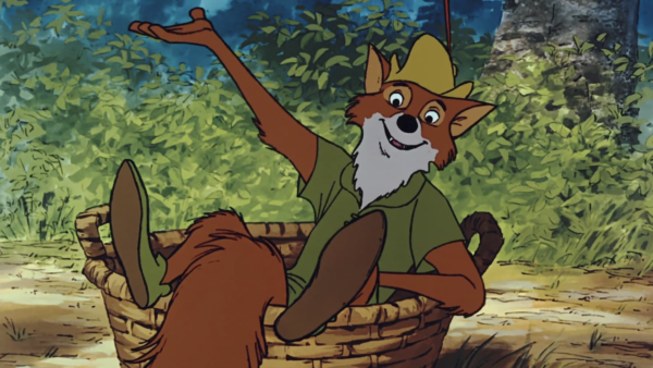 Le renard animé en chemise et chapeau verts, inspiré par Robin des Bois, est assis dans un panier tressé, un bras levé, entouré d'un feuillage luxuriant - une scène qui rappelle la première du film le 8 novembre 1973.