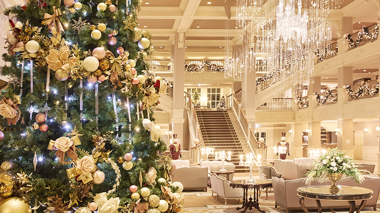 inside the disneyland hotel with christmas tree