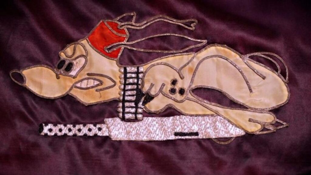 pluto sur une insigne militaire franc aise